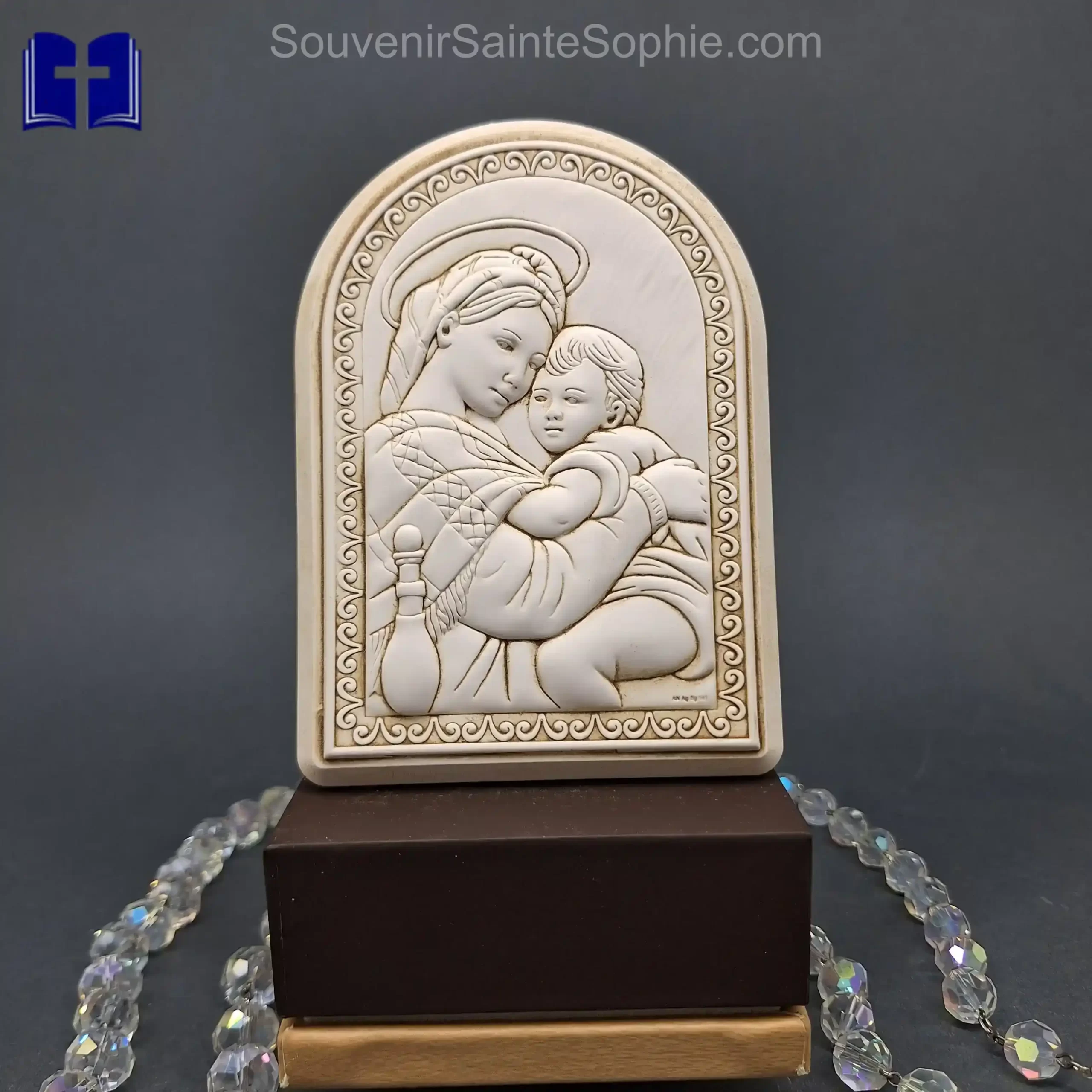 Virgin mary with child in resin